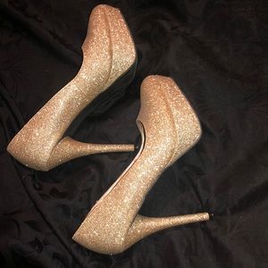 Gold high heel shoes
